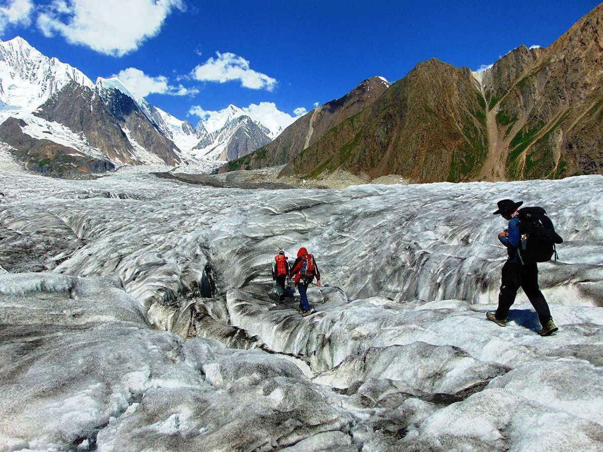 hikking on glacier-spantik base camp trek